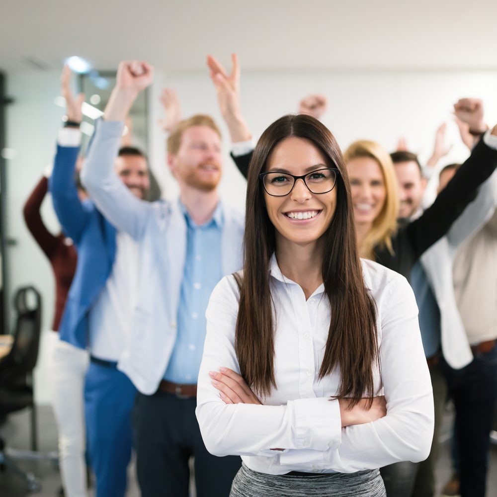 Group of successful business people happy in office